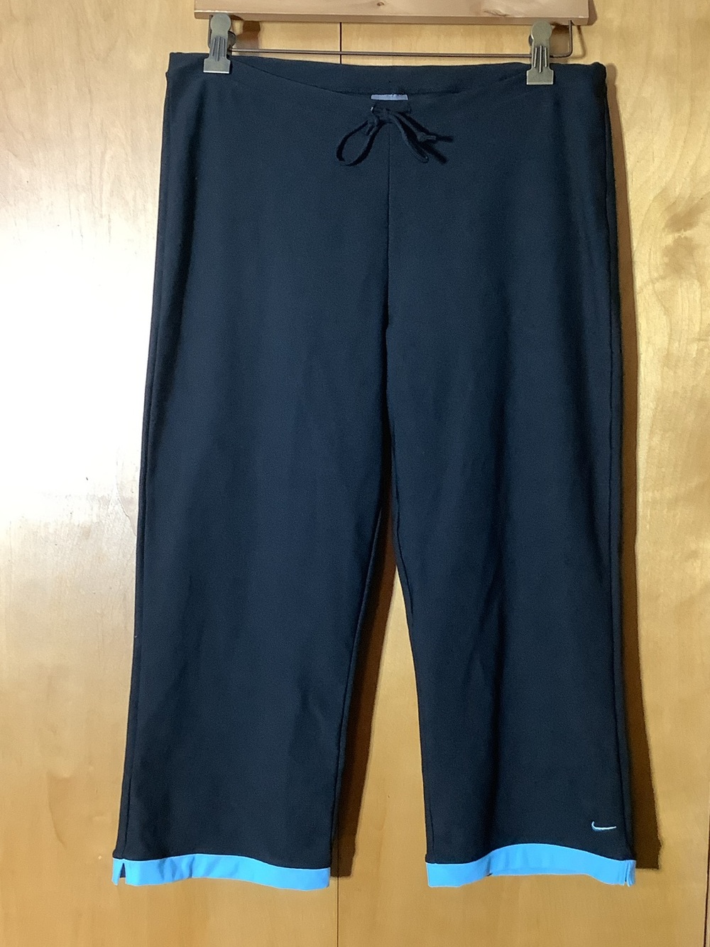 Nike Dr-Fit black capris with aqua accents, size medium